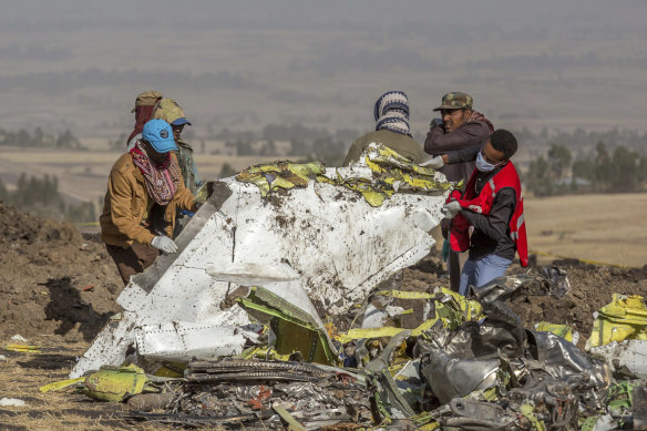 Rescuers at the scene of the Ethiopian Airlines crash. The number of airtravel fatalities have been rising, and 2019 won't change that trend.