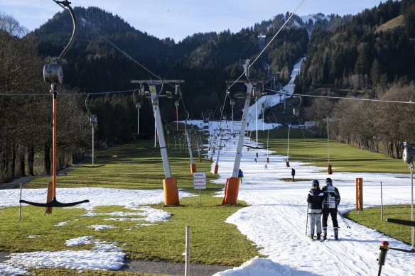 There’s not much snow in the Brauneck ski area in Lenggries, Germany. Unseasonably warm weather in much of Europe means grass is showing in alpine regions.