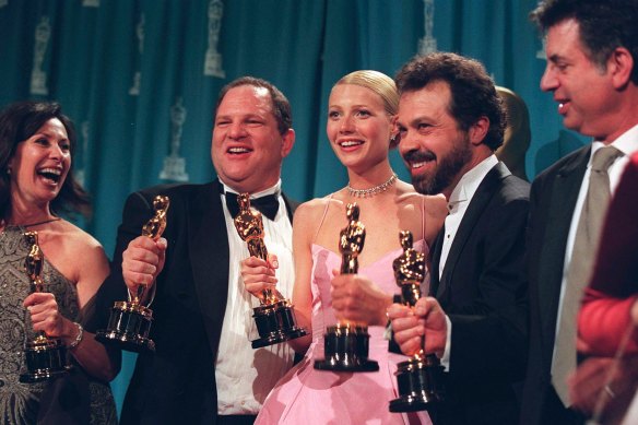 The now disgraced Harvey Weinstein, second left, celebrates alongside Gwynneth Paltrow after Shakespeare in Love won the best picture Oscar in 1999. 