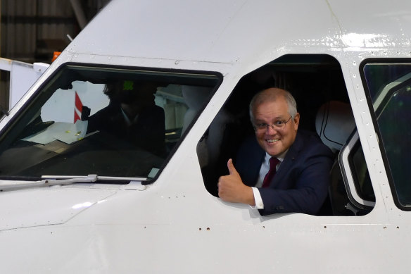Prime Minister Scott Morrison leaning ahead of announcing the $1.2 billion industry package on Thursday.