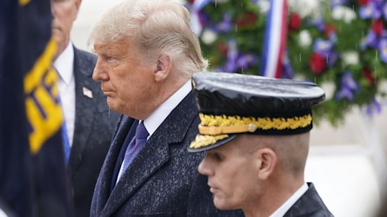 President Donald Trump at a National Veterans' Day ceremony on Wednesday, one of a few times he's been seen in public since the election.