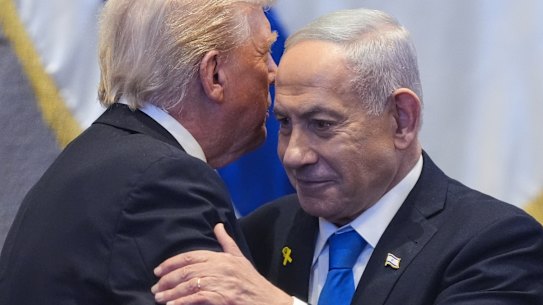 President Donald Trump talks with Israel’s Prime Minister Benjamin Netanyahu at the Knesset.