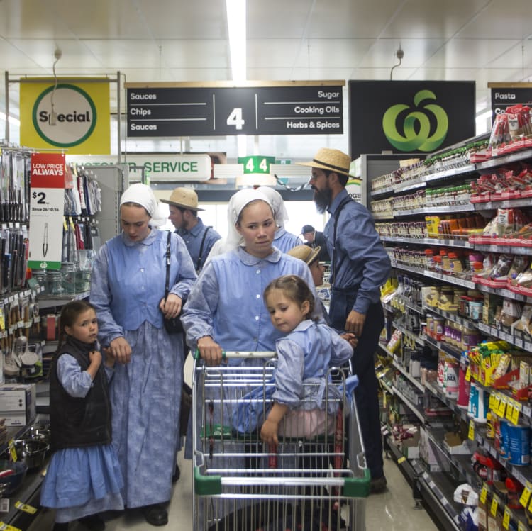 The McCallums go shopping in Woolworths. Elizabeth pushes Abi in the trolley.