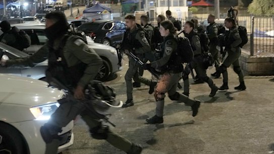Israeli Border Police are deployed near the Damascus Gate to the Old City of Jerusalem during a raid by police at the Al-Aqsa Mosque compound on Wednesday.