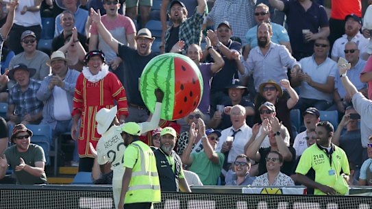 England’s Jofra Archer returns a beach ball to the Headingley crowd during the third Ashes Test in 2019.