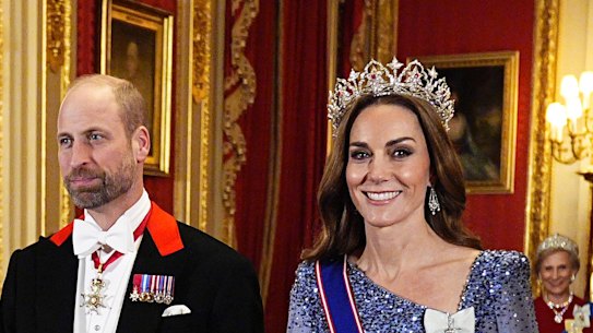 The Prince and Princess of Wales arrive for the state banquet at Windsor Castle on Wednesday.