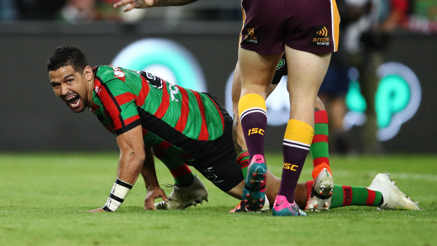 Doubling up: Cody Walker pays tribute to Greg Inglis with a goanna try celebration.