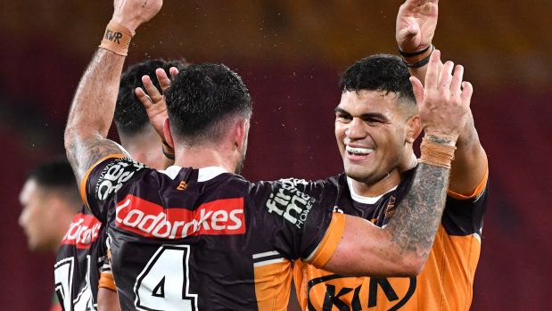 David Fifita (right) of the Broncos celebrates the win over Souths with Darius Boyd at Suncorp Stadium on Friday, March 20.