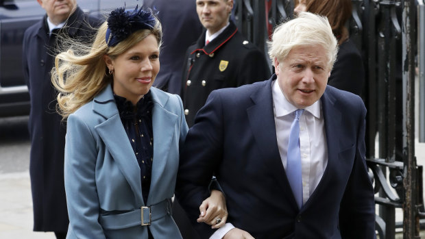 Britain's Prime Minister Boris Johnson and his partner Carrie Symonds arriving at Westminster Abbey in March.