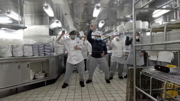 Cruise ship chef Mae Fantillo and her team keep up morale by broadcasting a flash dance in the kitchen.