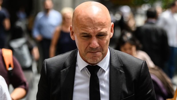 Former NSW detective Gary Jubelin arrives at the Downing Centre Local Court on Monday.