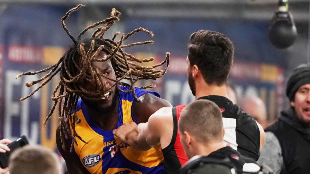 Zach Merrett pulled Nic Naitanui's dreadlocks, with the big Eagle then shoving the Bomber.