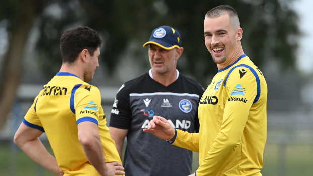 Brad Arthur chats to Mitchell Moses and Clint Gutherson at training.