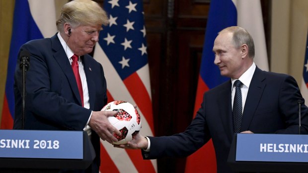 Putin presented a soccer ball to Trump during the press conference.