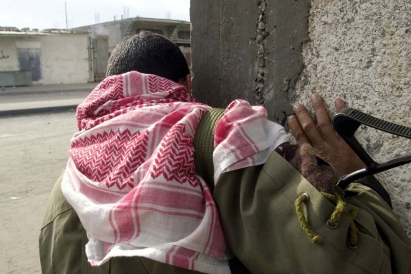 A Palestinian soldier in the Gaza Strip in November 2000.