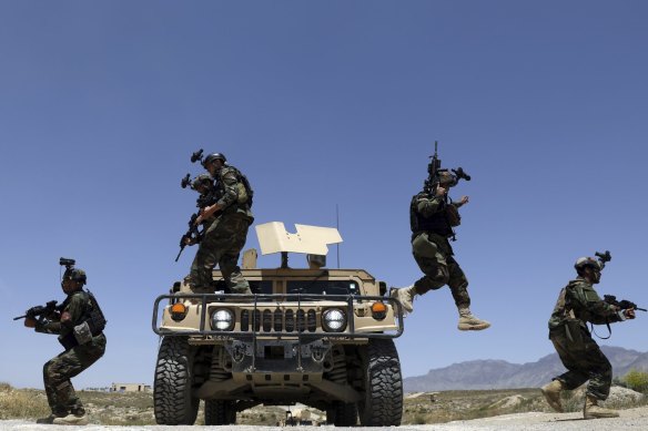 Afghan soldiers patrol outside their base on the outskirts of Kabul last month. By September 11 remaining US and allied forces are due to have left the country, ending nearly 20 years of military engagement. 