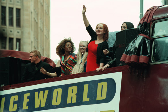 The Spice Girls arrive at Pitt St Mall, Sydney, on their bus.
