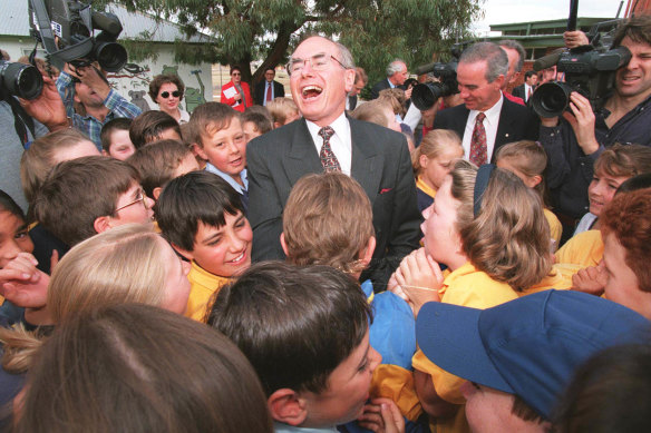 Man of the people: John Howard on the campaign trail.