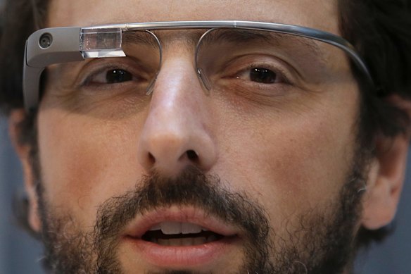 Google co-rounder Sergey Brin wears Google Glass glasses in 2013.