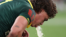 Reece Walsh vomits after his try.