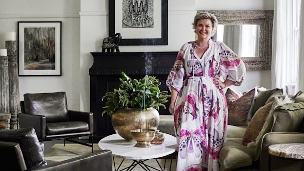 Kelly McCloskey in her upstairs lounge. The sofa is by Maker & Son; the artwork is by Bronwyn Bancroft.