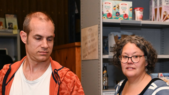 Andrea Norwood and Josh Palmer pick up food relief and supplies in Bayswater.