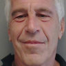 Jeffrey Epstein poses for a mugshot in 2013.