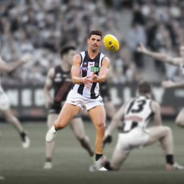 Scott Pendlebury disposes of the ball in round six against Essendon.  