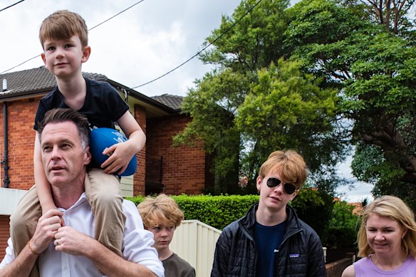 NSW premier elect Chris Minns with his family on Sunday morning.