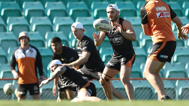 Still in the running: Robbie Farah takes part in Tigers training on Wednesday morning at Leichhardt Oval.