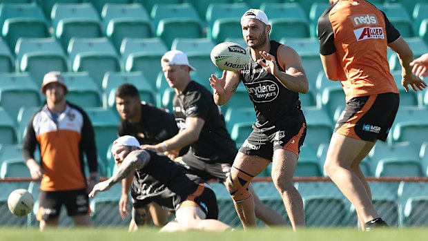 Still in the running: Robbie Farah takes part in Tigers training on Wednesday morning at Leichhardt Oval.