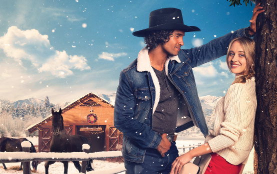 The poster for Mistletoe Ranch: a Christmas romance about a rising photographer (Mercy Cornwall) who heads back to the small American town she grew up in and finds sparks with her ex-fiance (Jordi Webber).