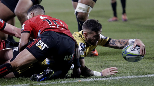Half measures: TJ Perenara scores for the visitors, but he was left to rue a crucial late error.