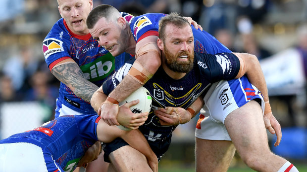 Storm utility Tom Eisenhuth is tackled while playing against the Knights.