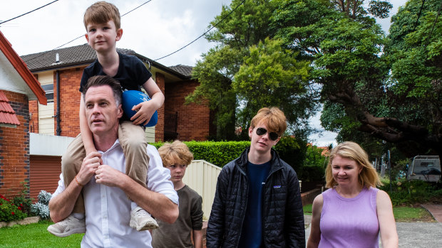 Premier Chris Minns with wife Anna and their sons, the day after he was elected a year ago.