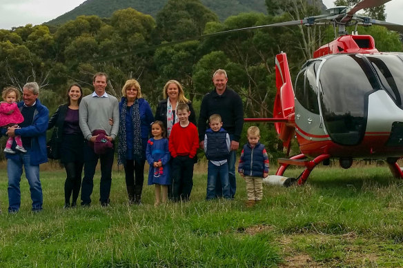 The Nesseler family at their helicopter business site.