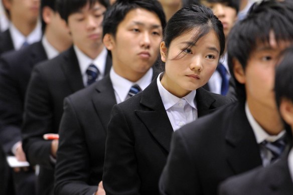 Recent high school graduates in Tokyo.
