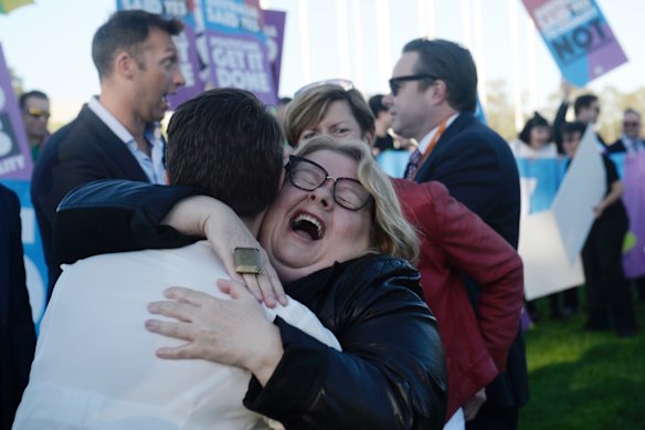 Magda Szubanski and others on the Parliament House lawn show excitement during the passing of the Same Sex Marriage bill in 2017.