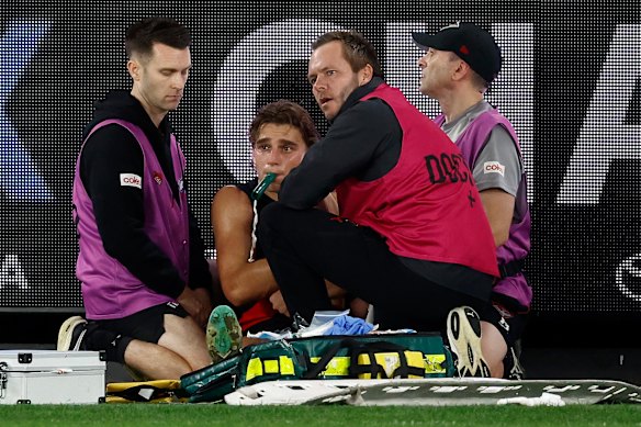 Harrison Jones gets immediate treatment on the ground.