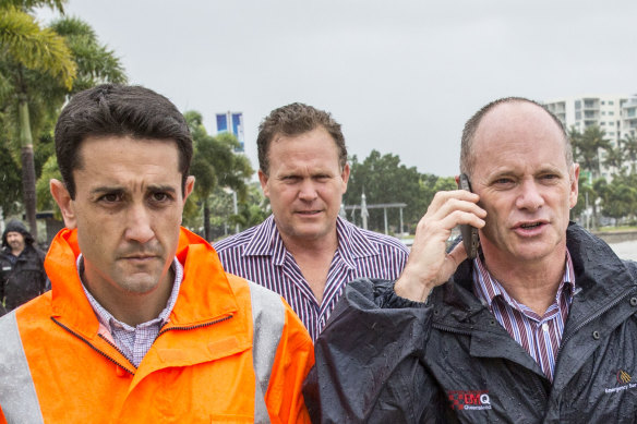 Then-community recovery minister David Crisafulli (left) with then-premier Campbell Newman in Cairns as Cyclone Ita approached in 2014.