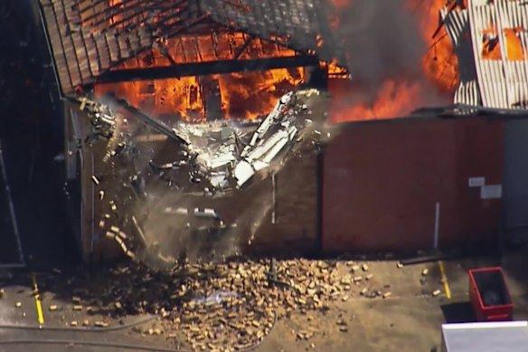 A brick wall collapsed at the furniture outlet as the fire ripped through the premises.