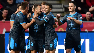 Double the fun:   Adam Le Fondre celebrates after scoring one of his two goals  against Adelaide on Friday night.