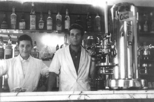 Giorgio Angele (left) working in a cafe in Rome with his older cousin.
