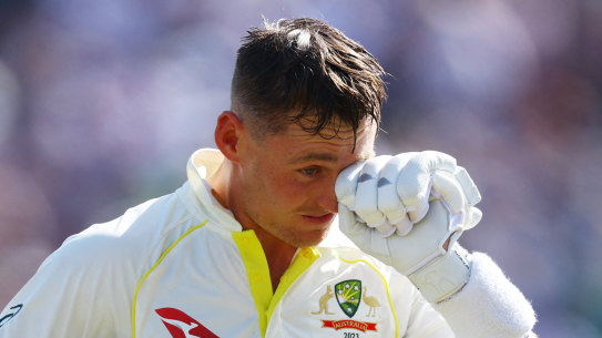 A dejected Marnus Labuschagne walks after losing his wicket, caught by Harry Brook off the bowling of Moeen Ali.