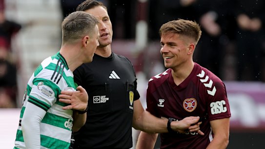 Cameron Devlin squares off with Celtic’s Callum McGregor.