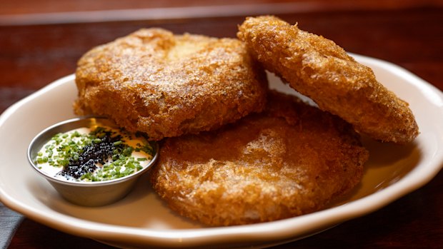 Potato cakes with creme fraiche and lumpfish caviar.