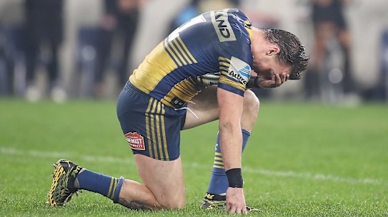 Clint Gutherson sinks to his knees after the win over the Panthers on Friday night. His grandfather had died the previous day.