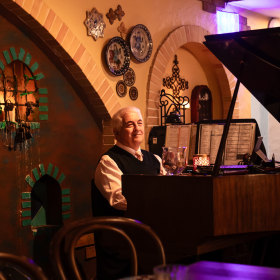 Show tunes are played on a grand piano.