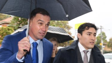 Australian musician Shannon Noll, left, arrives with his lawyer, Bryan Wrench, at Sutherland Local Court in Sydney on Thursday, 