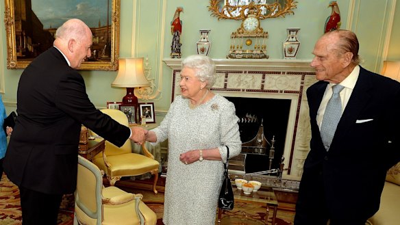 Sir Peter Cosgrove with the Queen and Prince Philip at Buckingham Palace in 2014.